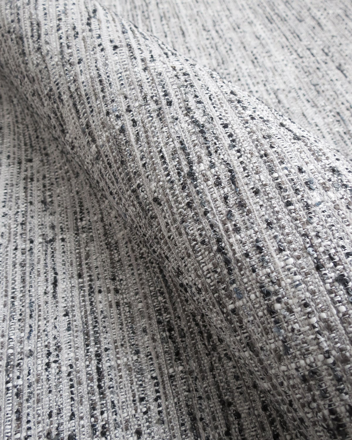 Sutherland Alloy Woven Speckled Upholstery Fabric from Finish Theory