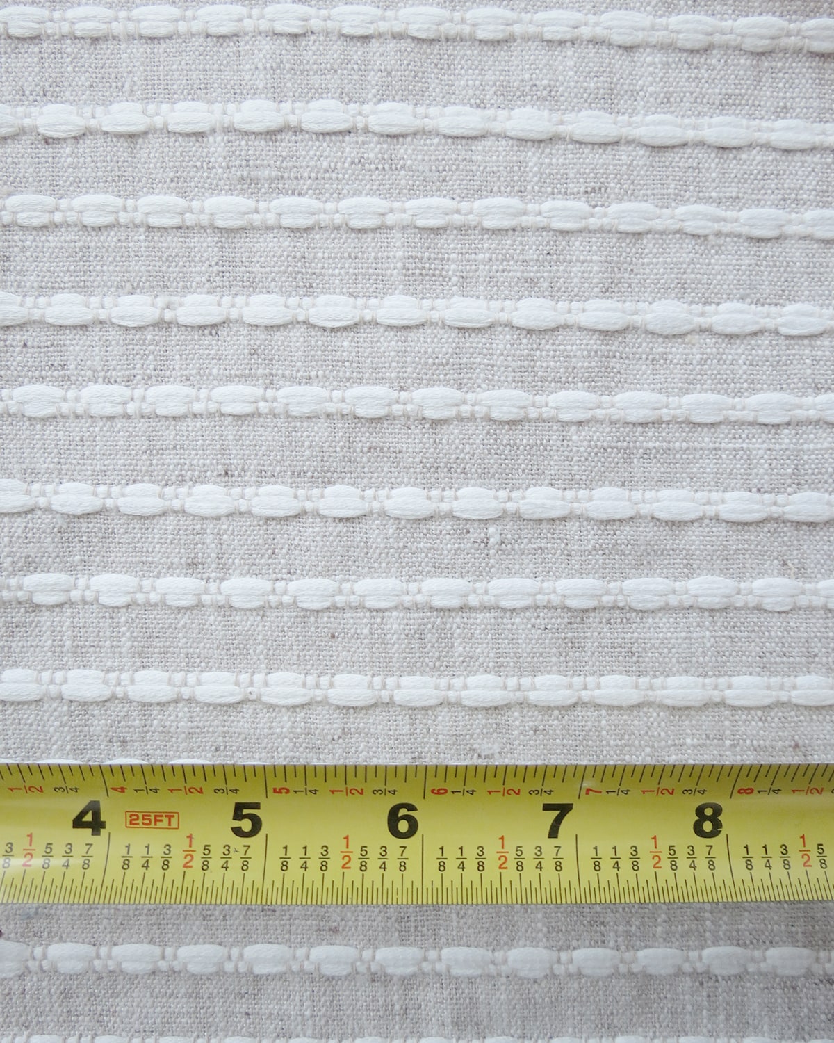 FTTEX10122 Elevena Natural Woven Textured Stripe Fabric Scale at Finish Theory