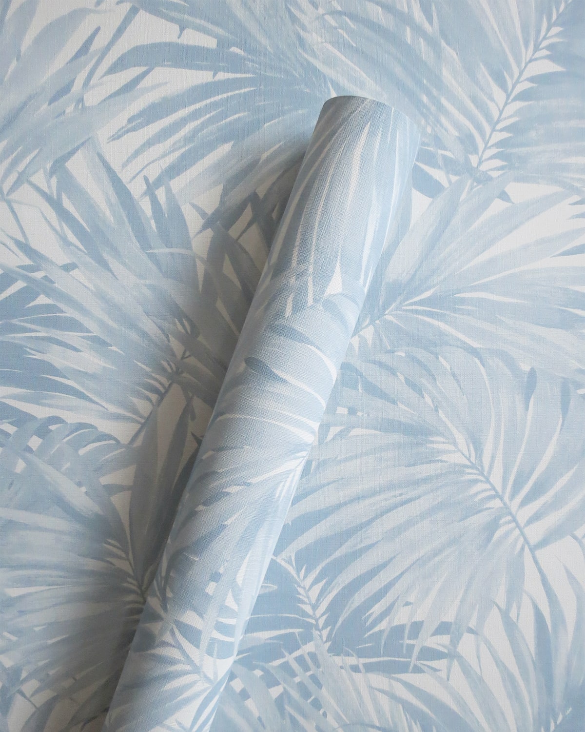 Venia Blue Skies Palm Leaf Unpasted Wallpaper Roll from Finish Theory